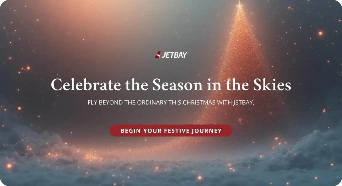 Jetbay Christmas campaign banner featuring starlit sky with golden Christmas tree promoting luxury private jet travel