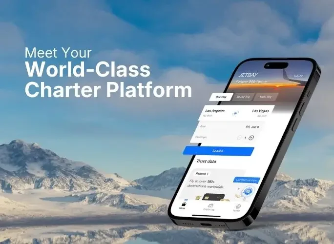 Jetbay mobile app interface displayed on smartphone against snow-capped mountain landscape backdrop