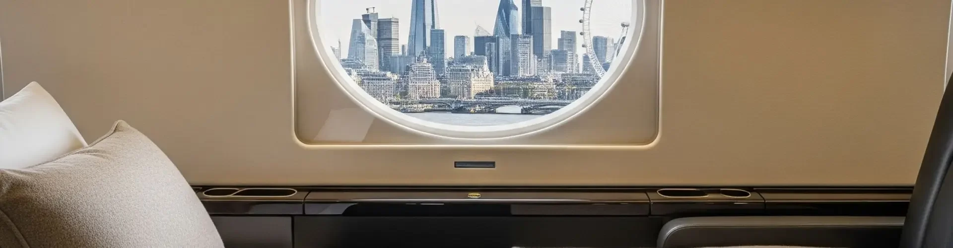 Private Jet Cost in the UK: Route & Aircraft Guide Luxurious private jet cabin bed with city skyline view through oval window during flight over urban landscape