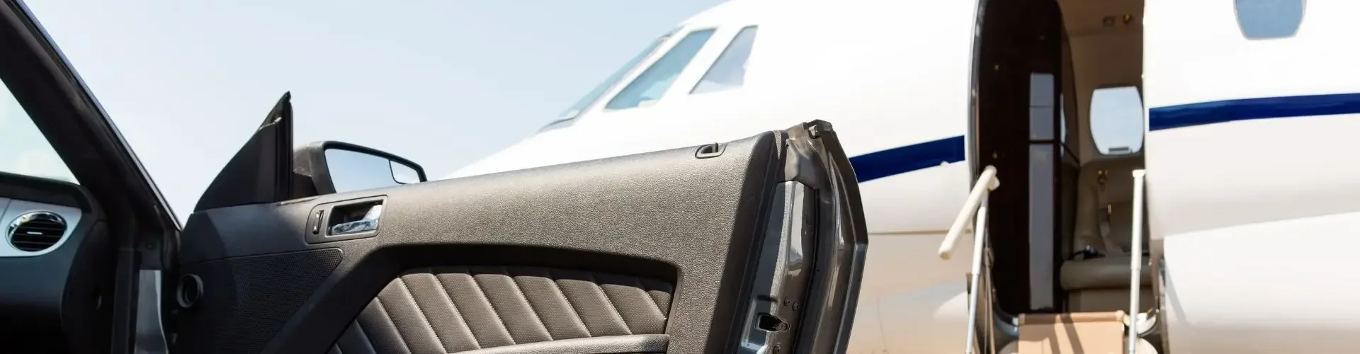 Luxury car door open beside private jet with passenger stepping out onto tarmac at exclusive airport