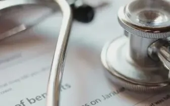 Medical stethoscope on patient charts highlighting air ambulance and medevac services in Canada