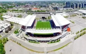 Modern soccer stadium green pitch white roof structure urban for a world cup card item