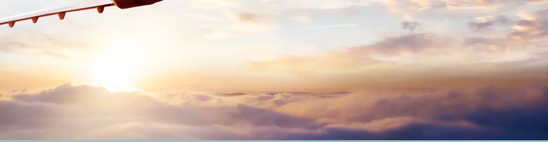 Luxury private jet soaring through golden sunset clouds above Asia for premium business travel