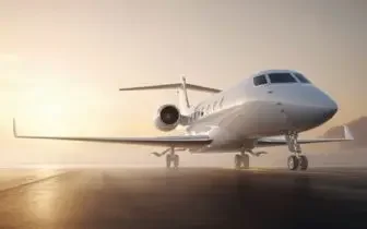 Sleek white private jet on tarmac during golden hour sunset, showcasing luxury charter aircraft options