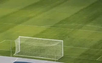 Soccer goal pristine green field for a world cup 2026 venue luxury private jet card item