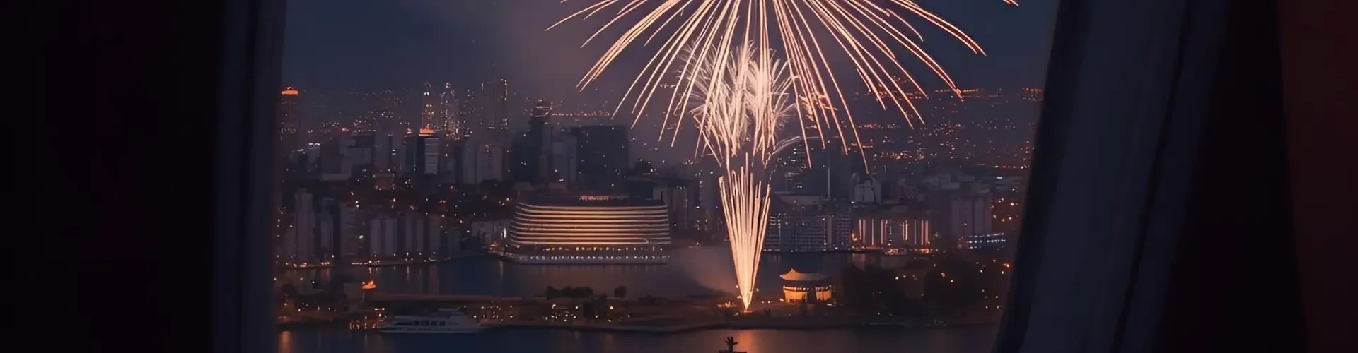 Spectacular fireworks display viewed through private jet window overlooking illuminated city skyline at night