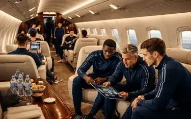 Group Charter for Sports Teams: Seamless Travel, Peak Performance Sports team members relaxing in luxury private jet cabin during charter flight with comfortable seating