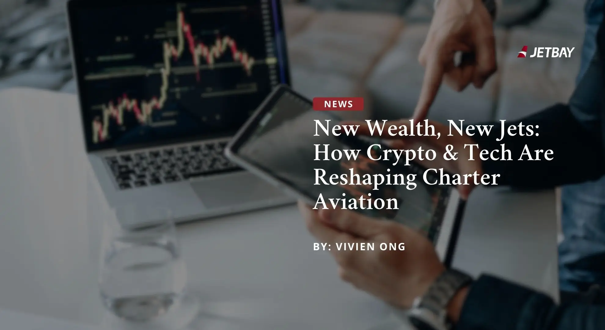 Business professional analyzing cryptocurrency market charts on laptop while using smartphone for JETBAY charter booking