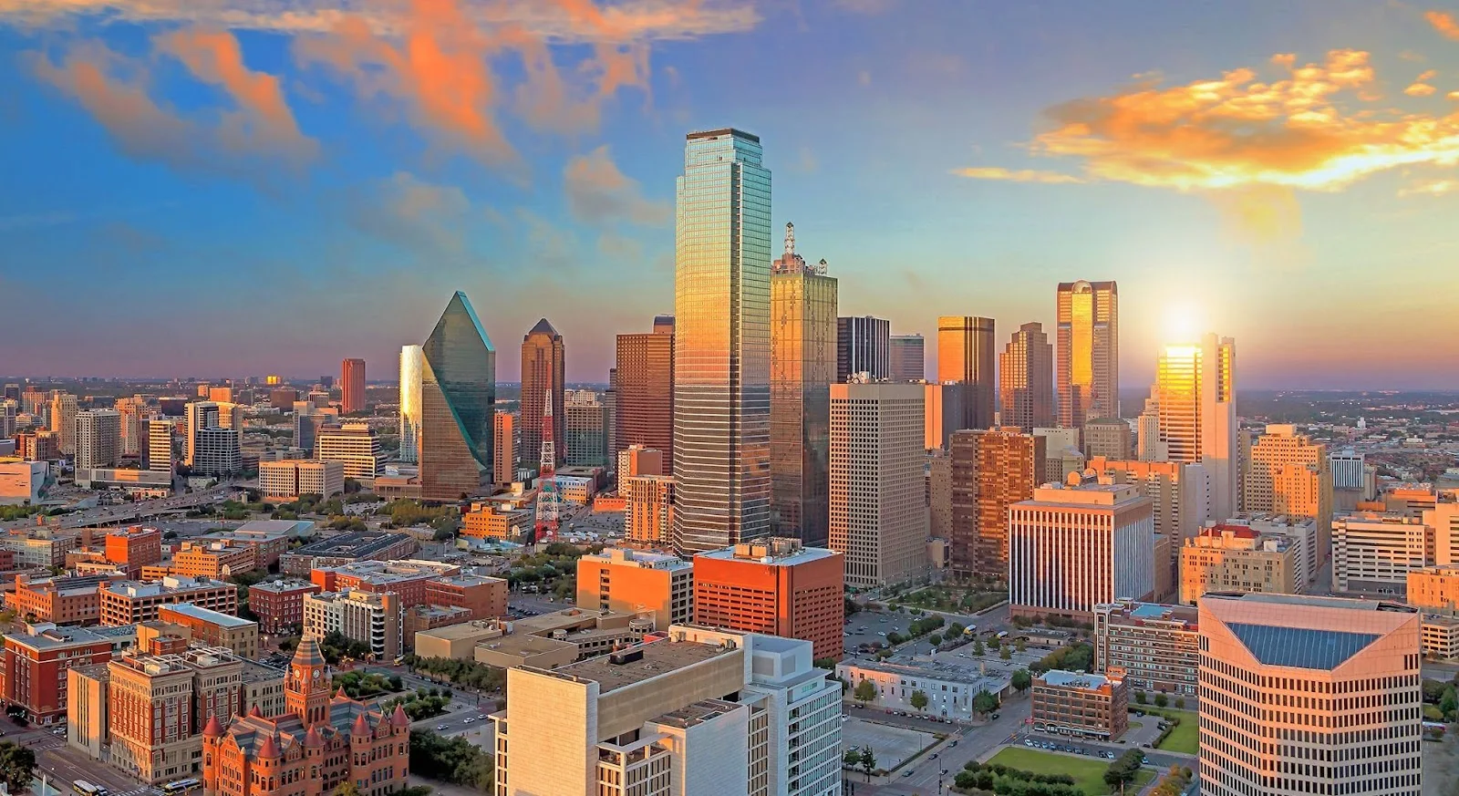 Dallas skyline at golden hour showcasing the vibrant business district for luxury private jet travel