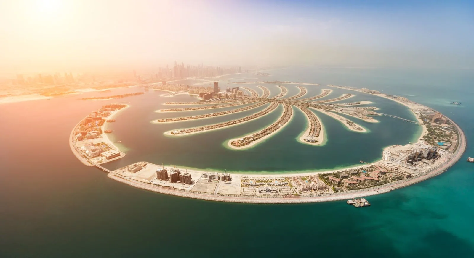 Aerial view of Dubai's iconic Palm Jumeirah artificial island showcasing luxury destinations for private jet travel
