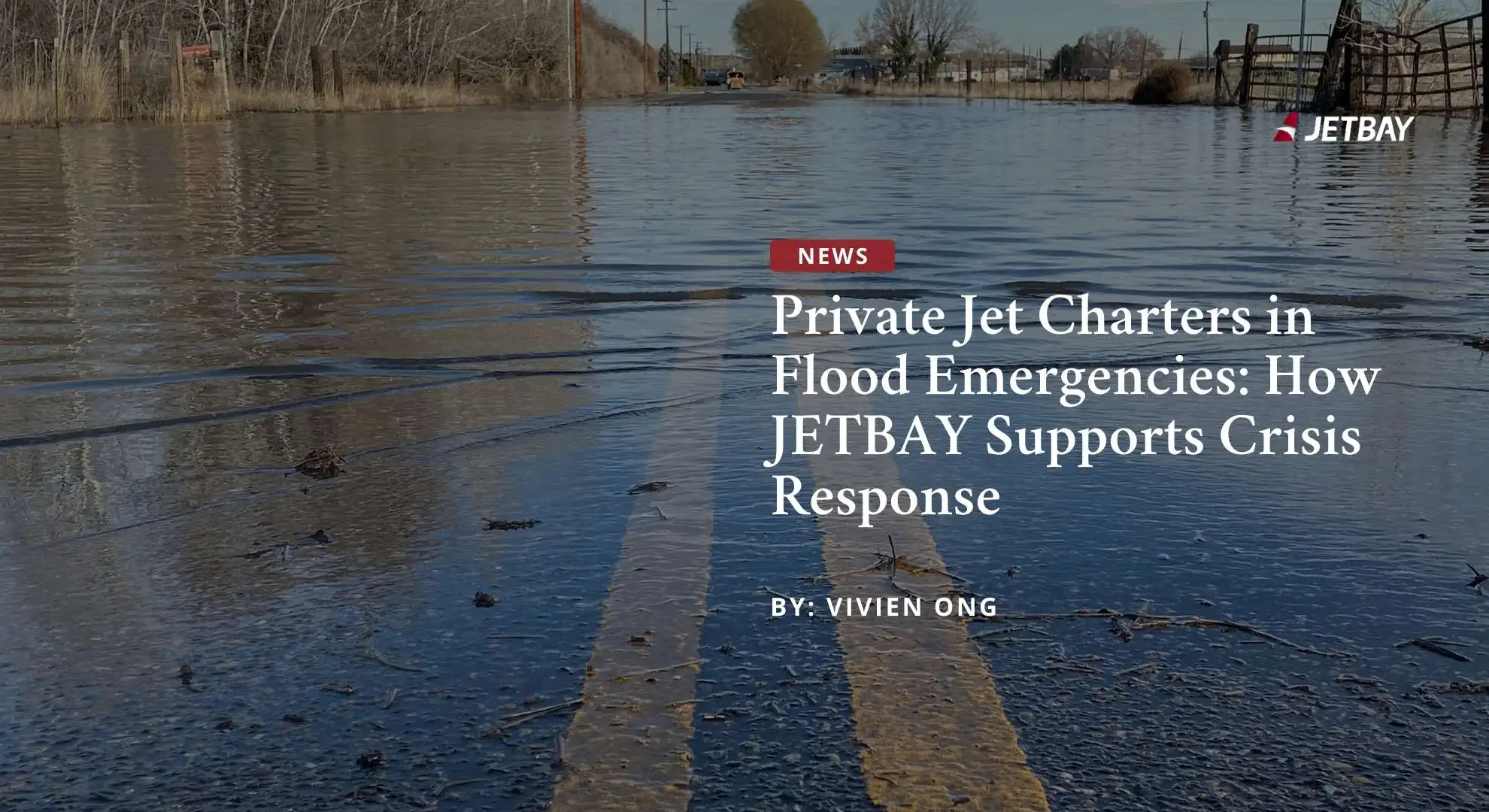 Flooded rural road with submerged pavement demonstrating emergency evacuation scenarios for JETBAY charter services