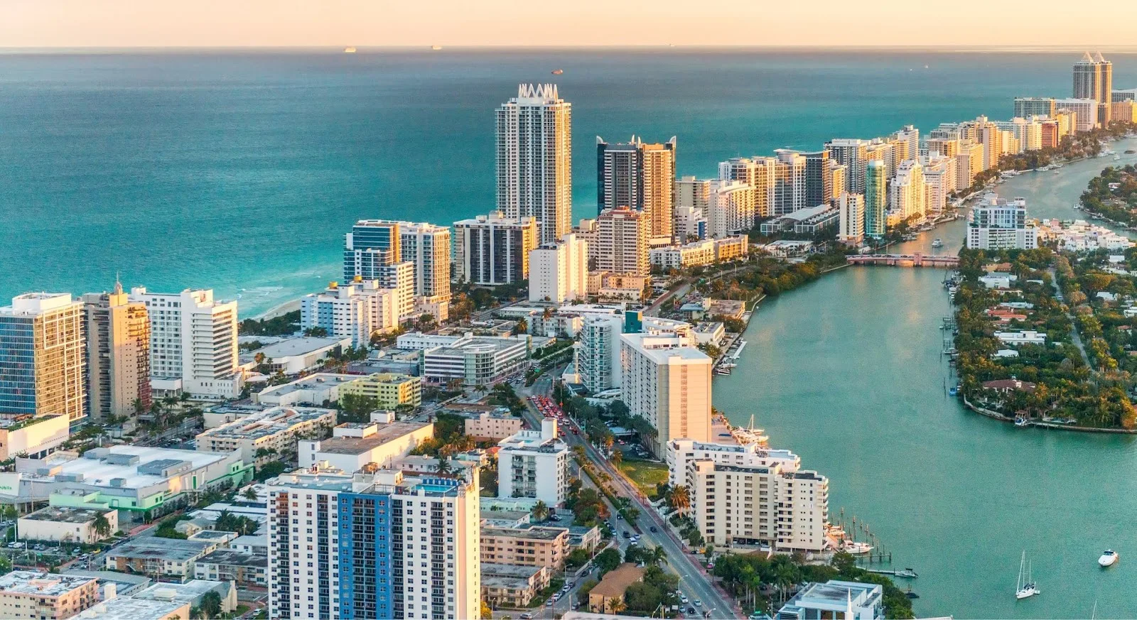 Aerial view of Miami Beach skyline and turquoise waters showcasing luxury travel destination for private jet charters