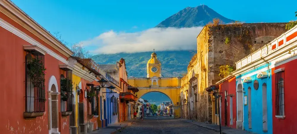 Cityscape of the main street of the historic city centre of Antigua, Guatemala during sunrise