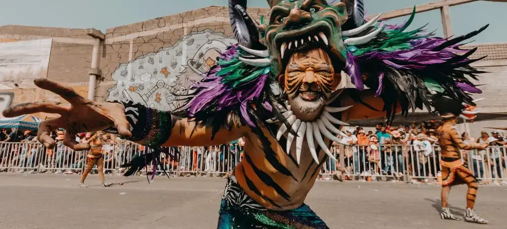 An artistic performance celebrating Dominican Republic Carnival wearing mask and costume of the Diablo Cojuelo