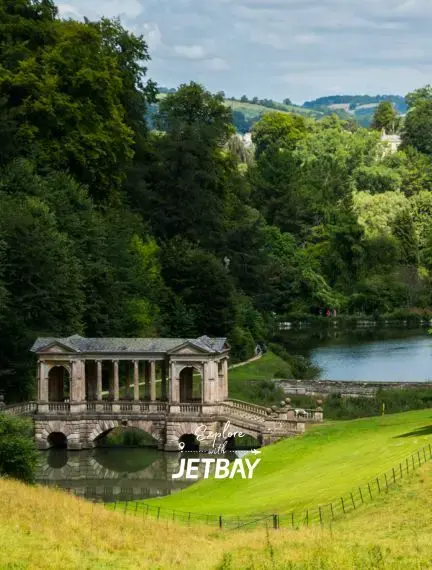 Palladian bridge and landscaped lake at Prior Park Landscape Garden overlooking Bath