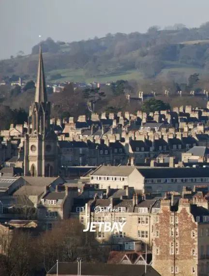 Panoramic view across Bath’s historic centre from the green hills of the Bath Skyline