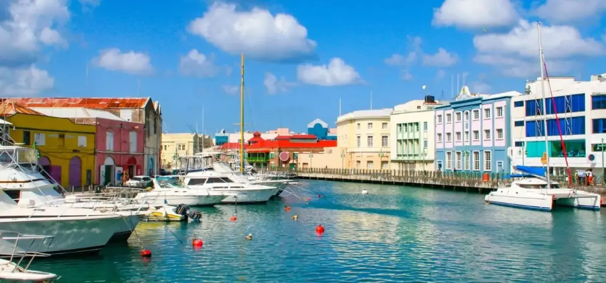 Colorful waterfront buildings and yachts moored in Bridgetown Harbour, Barbados
