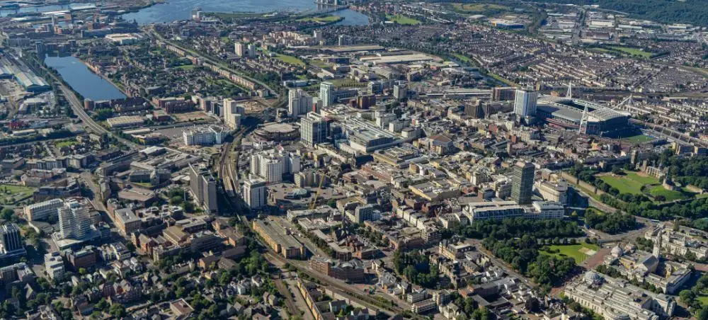 Aerial view of Cardiff city, Wales, showing the stadium, civic buildings, and River Taff, a popular private jet destination