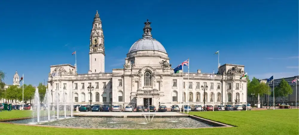 Cardiff City Hall with ornate dome and clock tower, a landmark near Cardiff Airport for private jet travellers to Wales