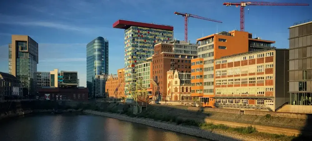 Modern office buildings in Düsseldorf, Germany, reflecting the city’s corporate travel demand