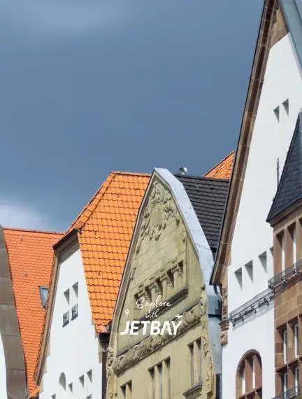 Historic street in Düsseldorf Old Town with restaurants, shops, and traditional architecture