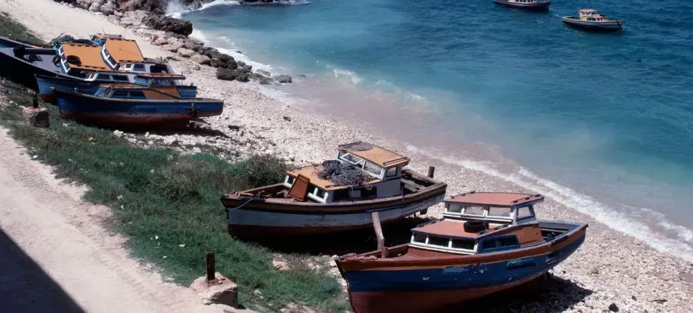 Fishing boats moored on the beach at Bathsheba, Barbados, West Indies