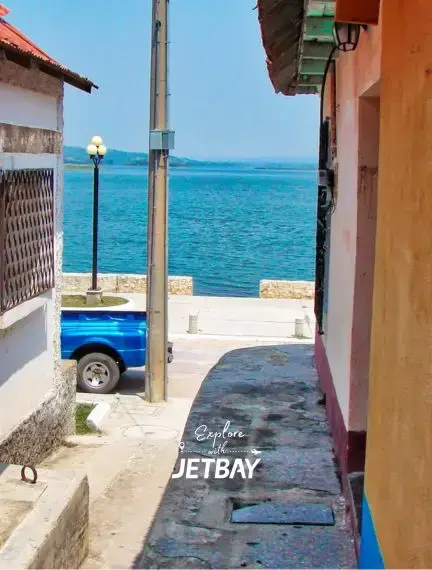 Colourful street on Flores island overlooking Lake Peten Itza in Guatemala