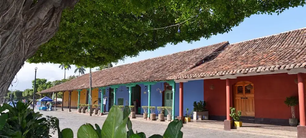 Colorful colonial architecture on a quiet street in Granada, Nicaragua