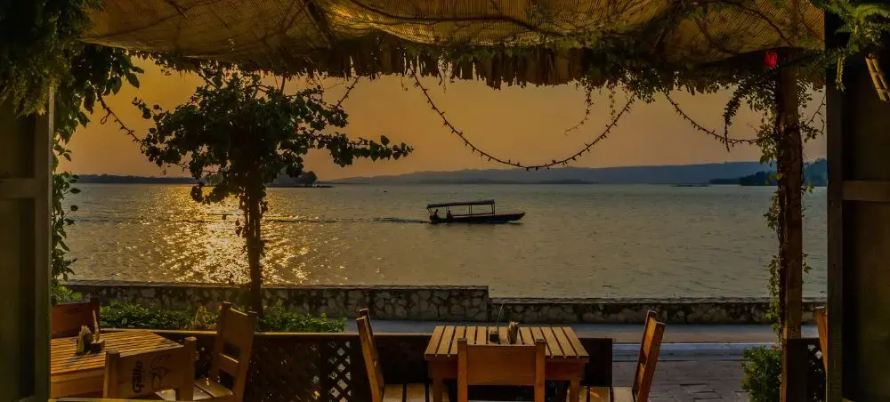 Dinner by the waterfront during sunset in Isla de Flores, Guatemala Island