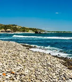 Pacific coastline in La Libertad, El Salvador, with beach and coastal hills