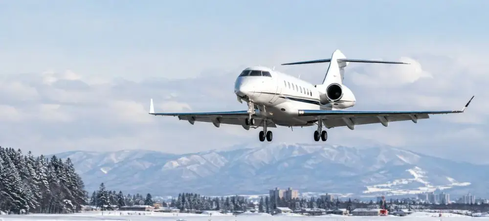 Private jet making a descend for a charter flight to Sapporo, Japan during winter