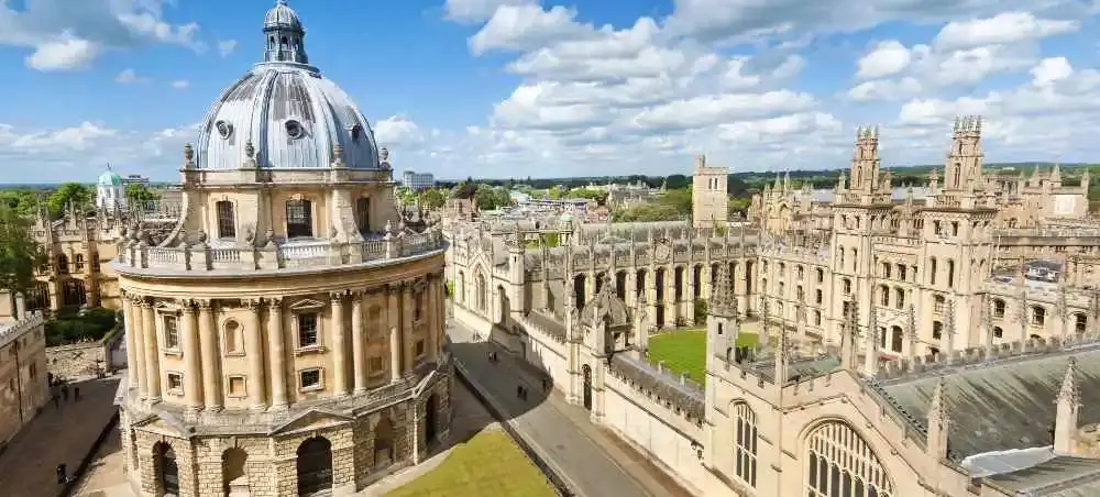 Aerial view of Oxford's iconic Radcliffe Camera and All Souls College, a destination accessible by a private jet to England