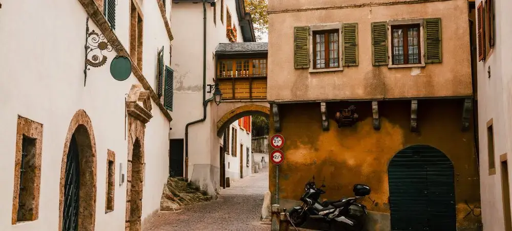 Rue du Vieux Collège Street in Sion, Switzerland with traditional historic architecture
