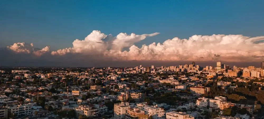 Cityscape of Santo Domingo under sunlight and cloudy sky in Dominican Republic