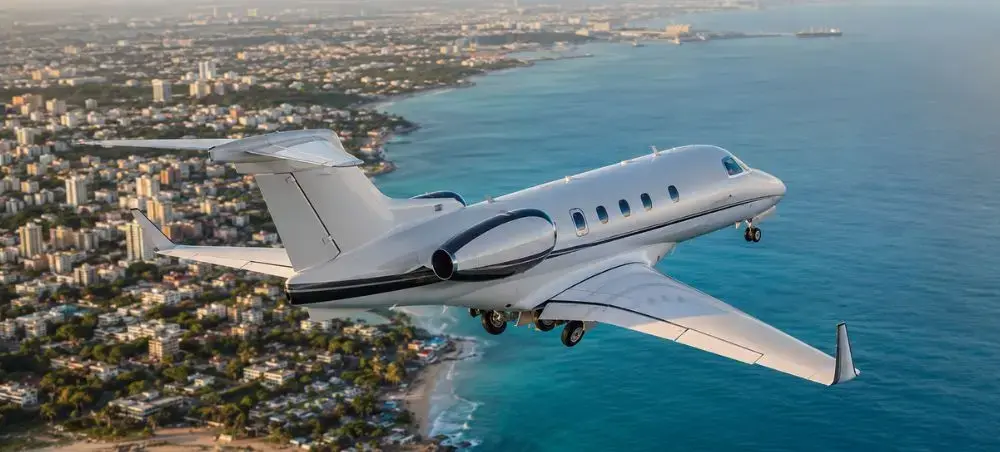 Embraer Phenom private jet departing Santo Domingo Dominican Republic over the Caribbean Sea