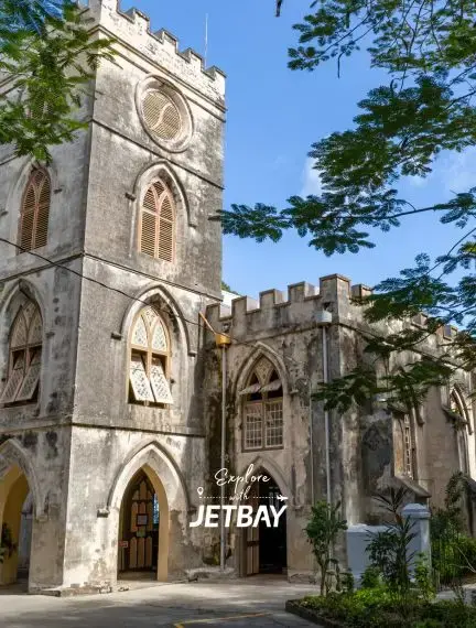 Historic St. James Parish Church in Holetown, Barbados, featuring Gothic stone architecture and bell tower