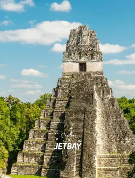 Tikal temple rising above the jungle canopy in northern Guatemala