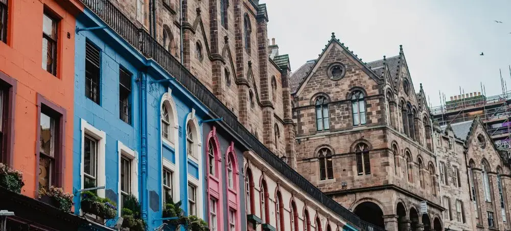 Colourful Victorian shopfronts on Victoria Street in Edinburgh's Old Town