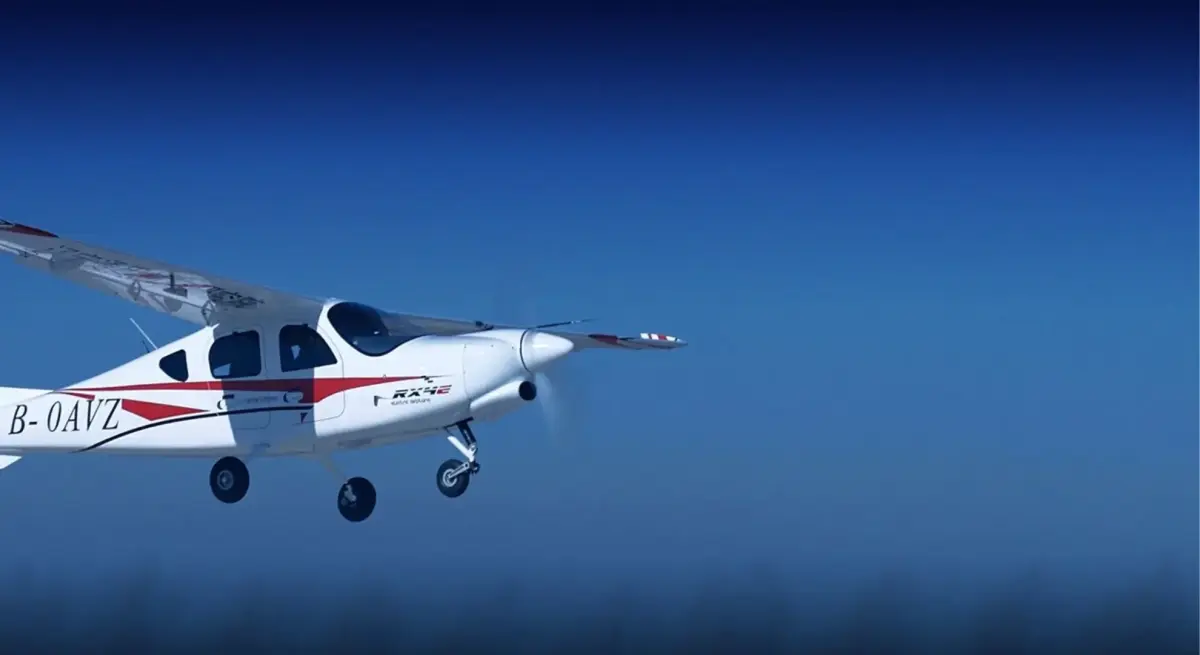 China's RX4E electric aircraft in flight against blue sky