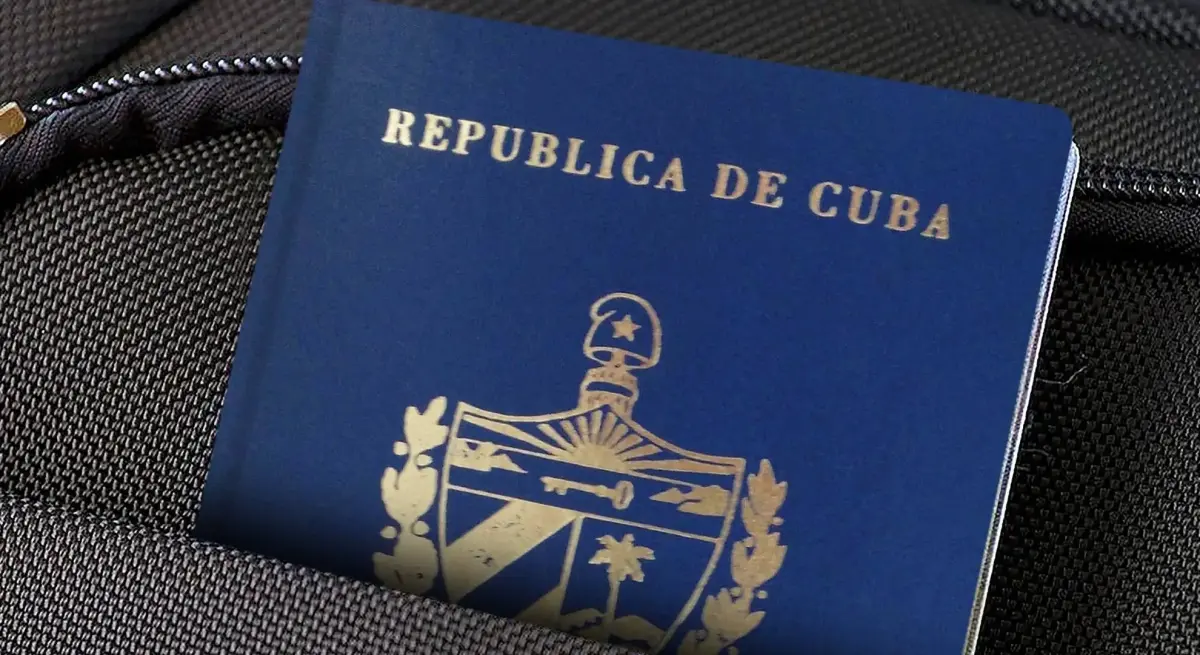 Cuban passport resting on a travel bag, representing documentation requirements amid shifting border policies affecting private jet charter routes to Cuba
