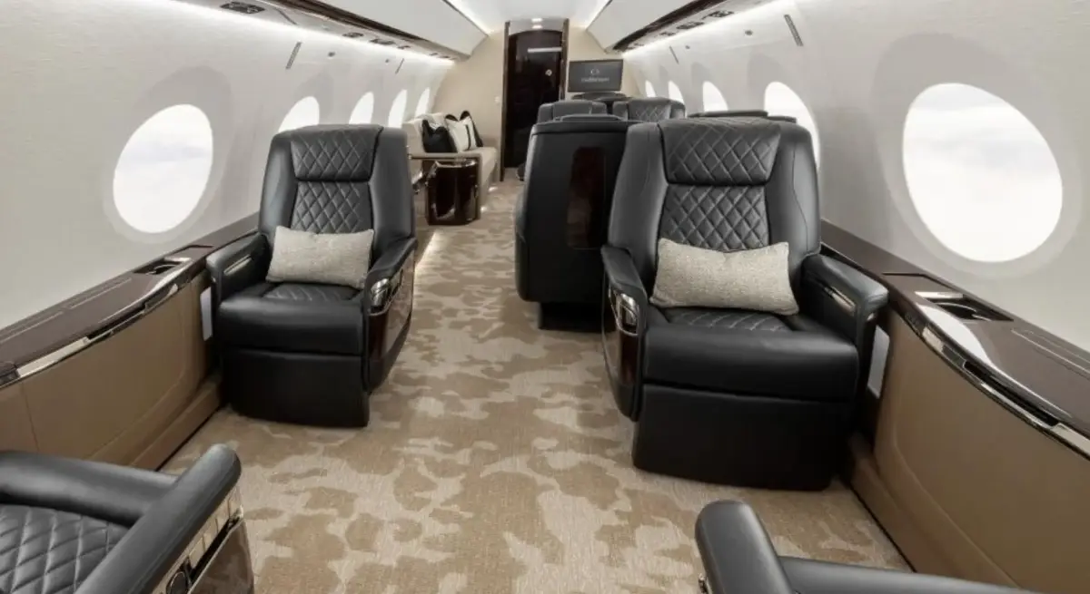 Luxurious Gulfstream G800 cabin interior featuring quilted leather seats and premium amenities